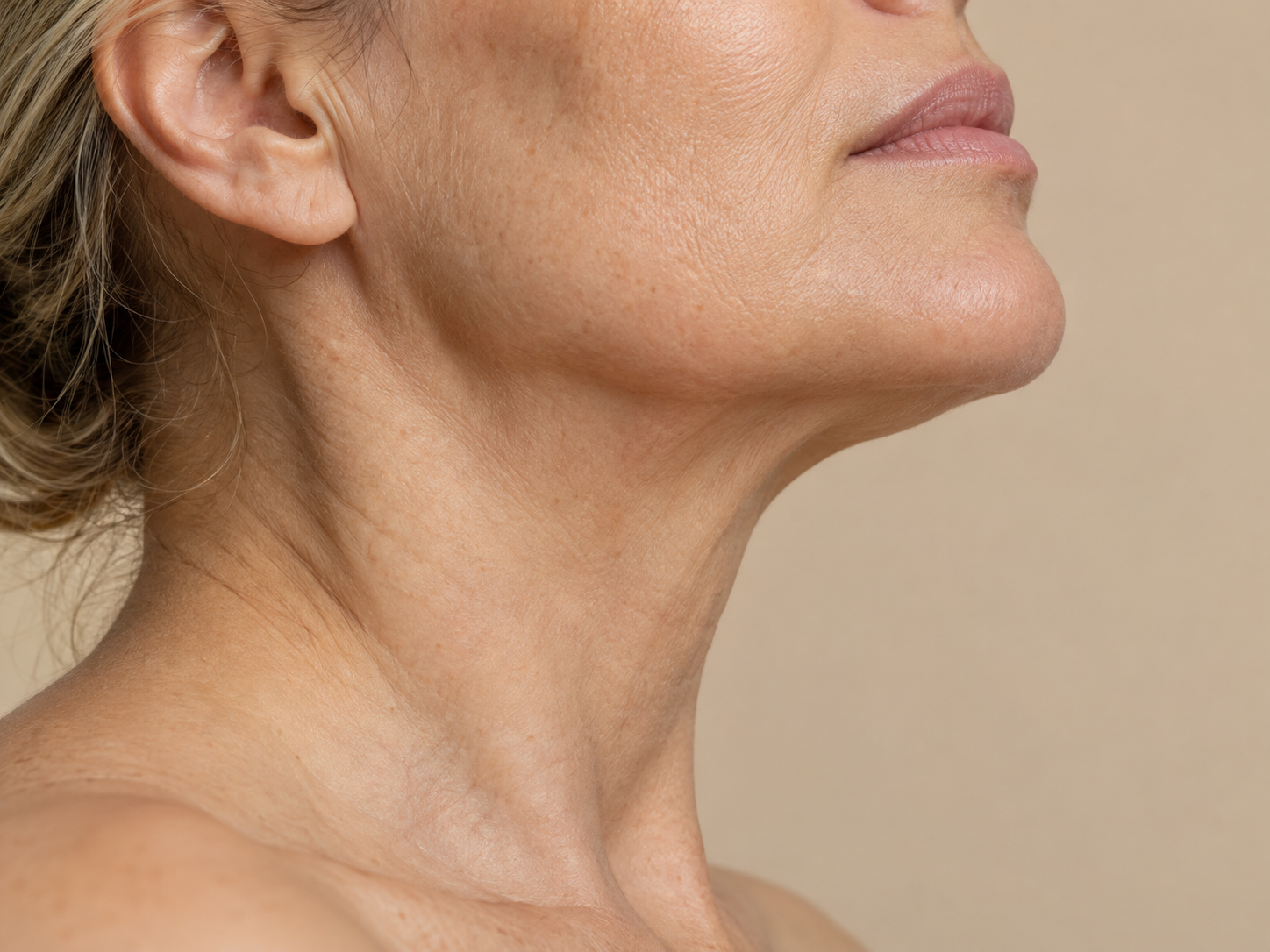 Side view of a woman's neck and jawline
